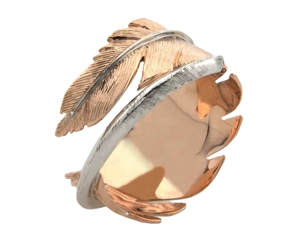 Piuma ring in rose gold and white gold, handcrafted narrative piece of jewellery inspired by lightness and freedom