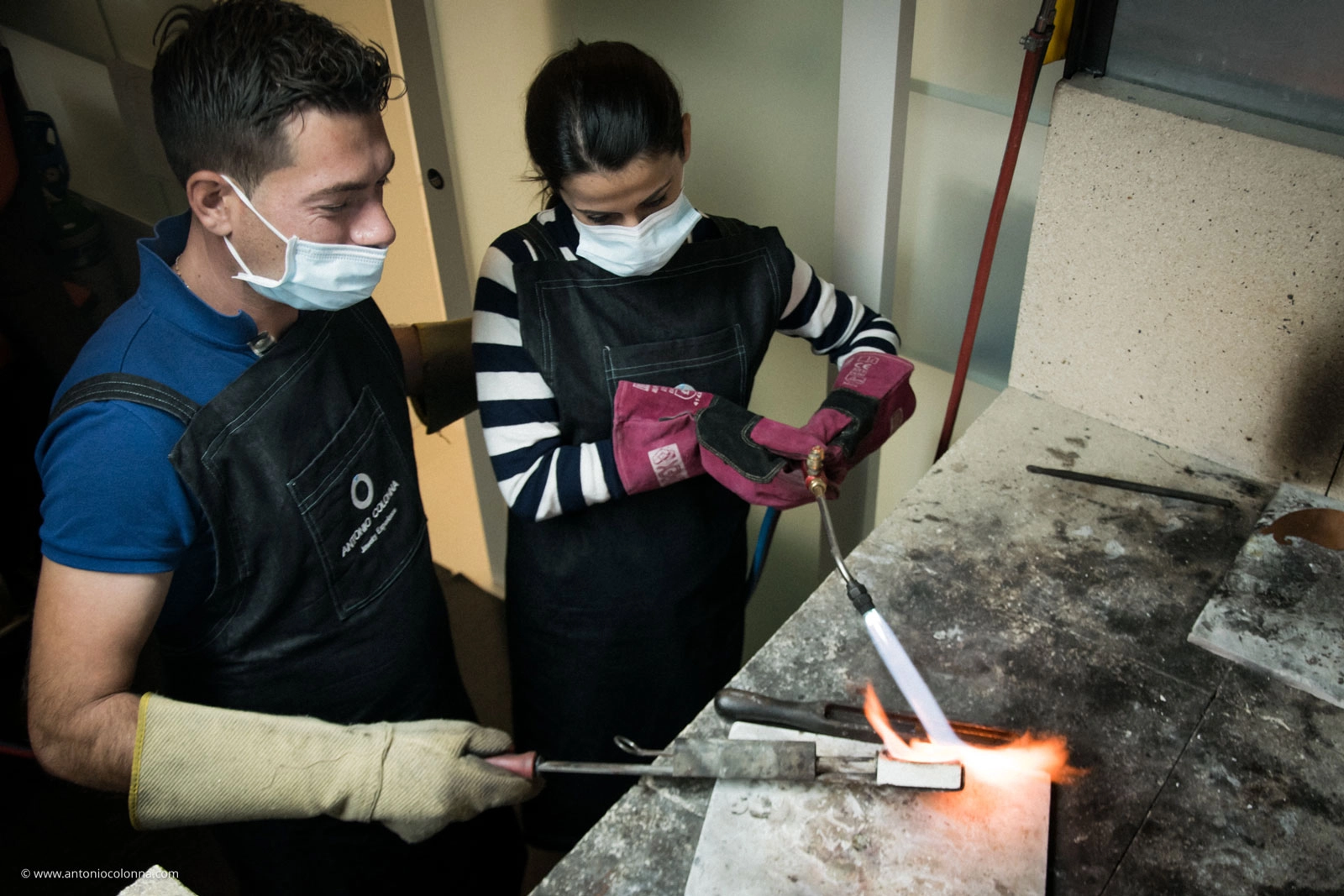 Metal melting phase during the artisanal creation of narrative wedding rings
