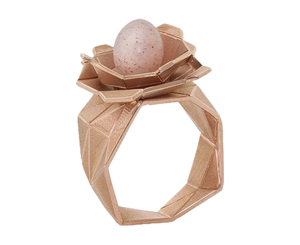 Nest Ring with a central stone set in a handcrafted rose gold setting