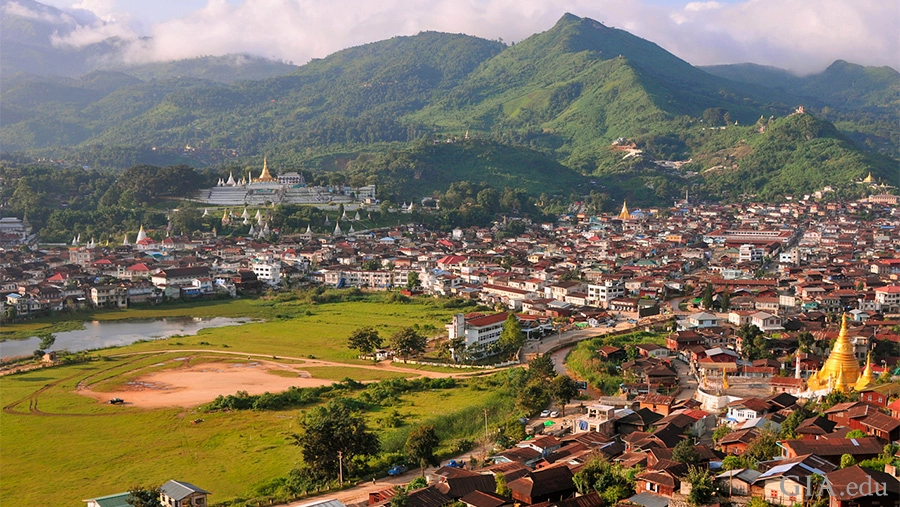 City surrounded by mountains in a ruby-mining region