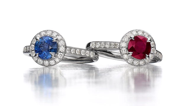 Rings with red ruby and blue sapphire surrounded by diamonds